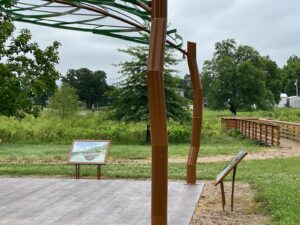 a view of Eufaula Wetland including pavillion and boardwalk overlook