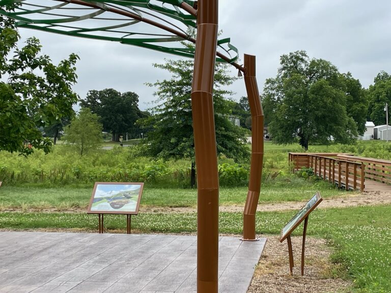 a view of Eufaula Wetland including pavillion and boardwalk overlook